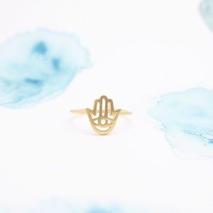Brushed gold evil eye hamsa hand ring